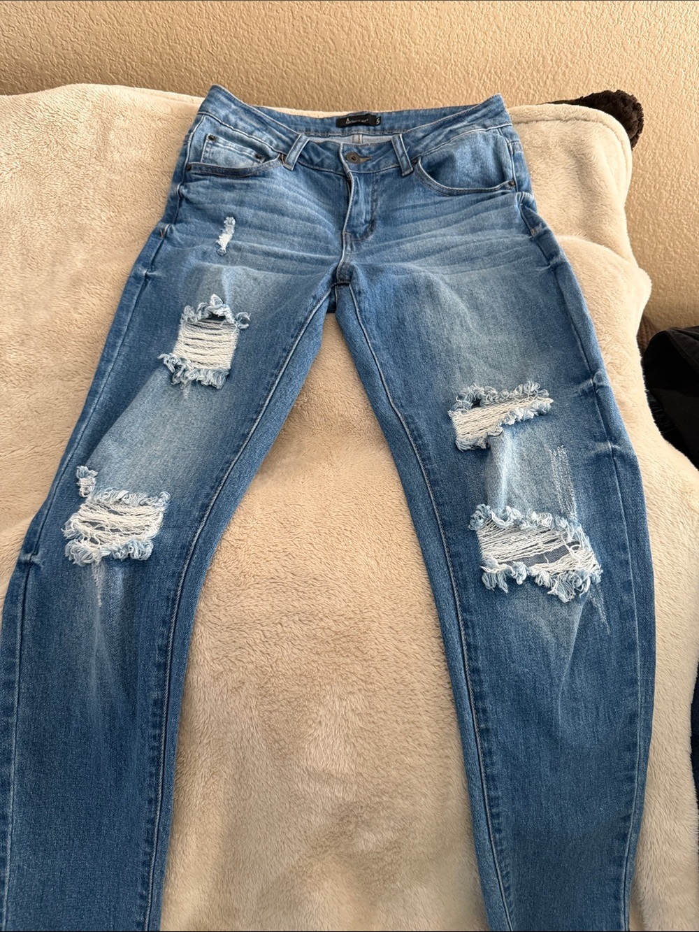 Women’s Distressed Blue Ripped Jeans